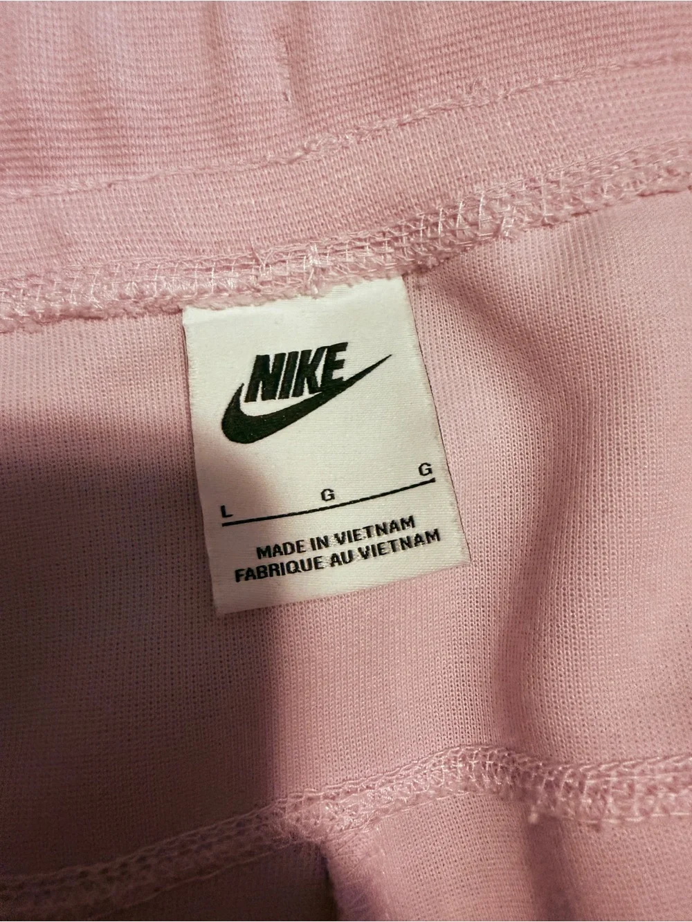 Nike Women’s Light Pink Full-Zip Tech sweatsuit